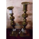 Two Victorian brass candlesticks