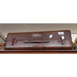 An old American Samsonite suitcase with metal label to front