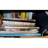 A box containing a large collection of assorted hard back and other books including aircraft,