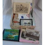 A box containing ephemera, mint stamp pack and assorted local interest and other postcards