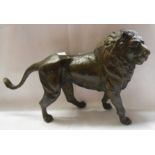 A large bronze figure depicting a lion