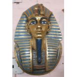 A vintage pressed plastic Tutankhamun decorative wall hanging