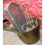 A large brass log basket - sold with assorted brass fire irons, helmet coal scuttle and a mesh