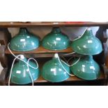 Six vintage green enamel industrial style pendant lampshades - some fitted with later plastic