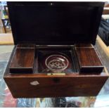 A Victorian rosewood veneered sarcophagus tea caddy with original tea cannisters and replacement (