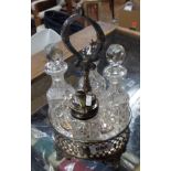 A 19th Century silver plated cruet stand with four glass condiment bottles