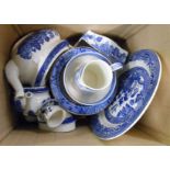 A box containing a quantity of blue and white china including Willow pattern, etc.
