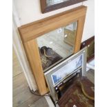 A pair of modern hardwood framed bevelled oblong wall mirrors - 61cm X 92cm