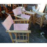 Four folding directors style chairs