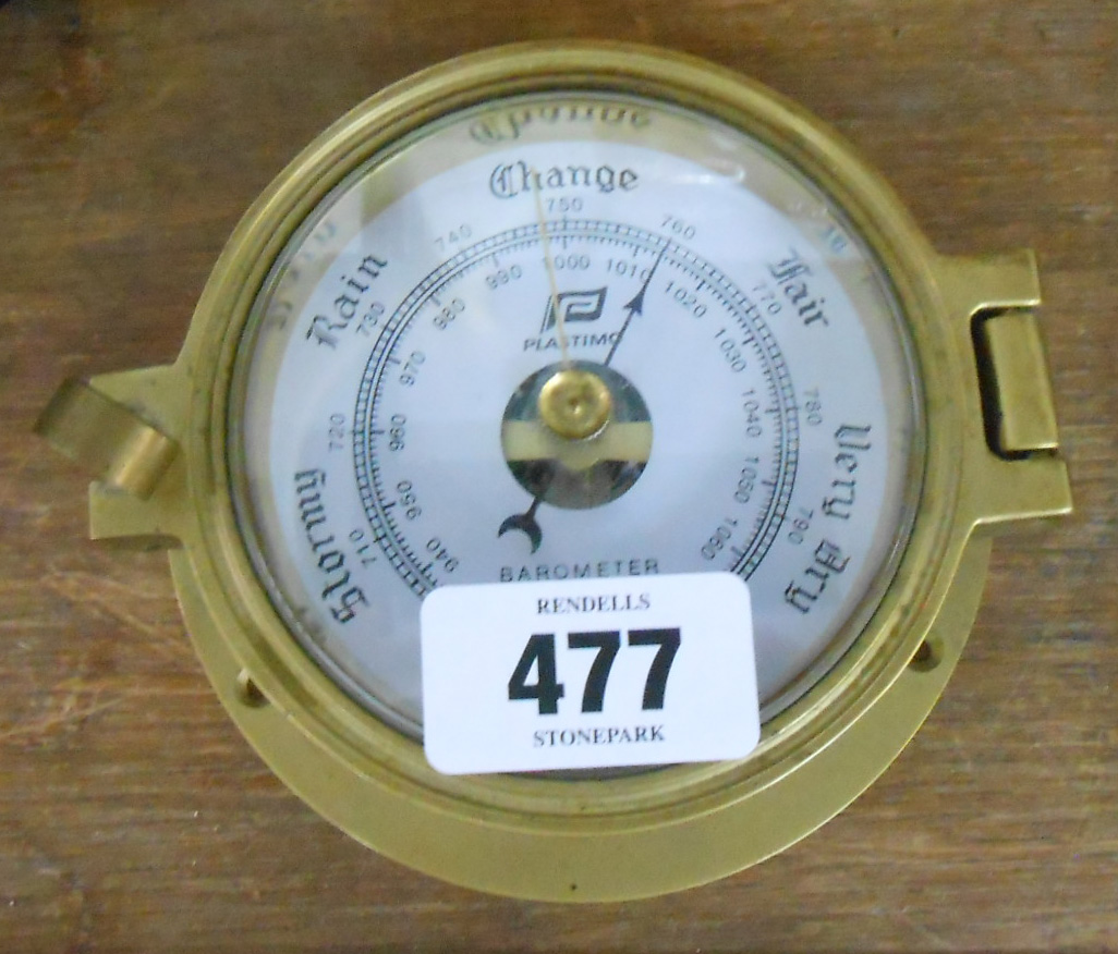 A small cast brass cased Plastimo bulkhead barometer with aneroid works