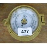 A small cast brass cased Plastimo bulkhead barometer with aneroid works