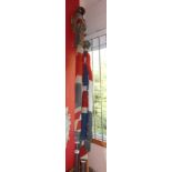 A large Victorian Union flag on original flagpole with bun finial to top and original linen flag -