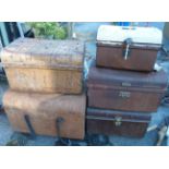 Five old tin trunks of various size