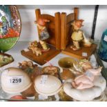 A pair of Hummel pottery boy, girl and farmyard figurines on wooden gate form bookend bases - sold