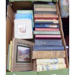 A box containing a collection of vintage assorted hard back books including children's titles,