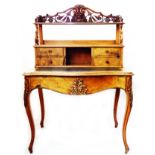 A 91cm walnut bonheur du jour with two open shelves and acanthus scroll supports, central recess and