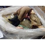 A bag containing a quantity of vintage dolls and stuffed toys - poor condition
