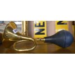 A reproduction brass bulb car horn