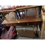 A 97cm mahogany sofa table with later cutlery adapted drawer interiors, set on flanking standard