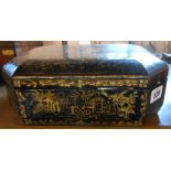 An old chinoiserie lacquered box with gilt decoration containing a quantity of old handkerchiefs and