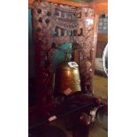 A Chinese cast brass bell with carved dragon form hardwood stand with striker - sold with a