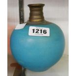 A studio pottery vase of bulbous form decorated with a blue glaze and bronze matt finish to the neck