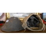 A World War II gas mask and helmet