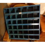 A 60cm vintage blue painted metal industrial wall mounted pigeonhole unit