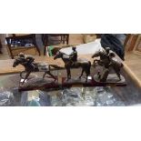 Three Atlas editions bronzed resin racehorse figurines depicting Najinsky, Shergar and Desert Orchid