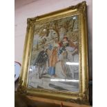 A Victorian embroidered panel in a gilt frame depicting Tudor figures in a landscape