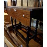 A 75cm 20th Century polished oak gateleg table, set on barley twist supports - one gate dowl a/f