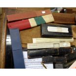 A quantity of vintage boxed and unboxed slide rules - various makers, size and condition