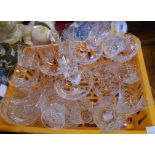 A small crate containing a quantity of Royal Doulton cut and other glassware including champagne