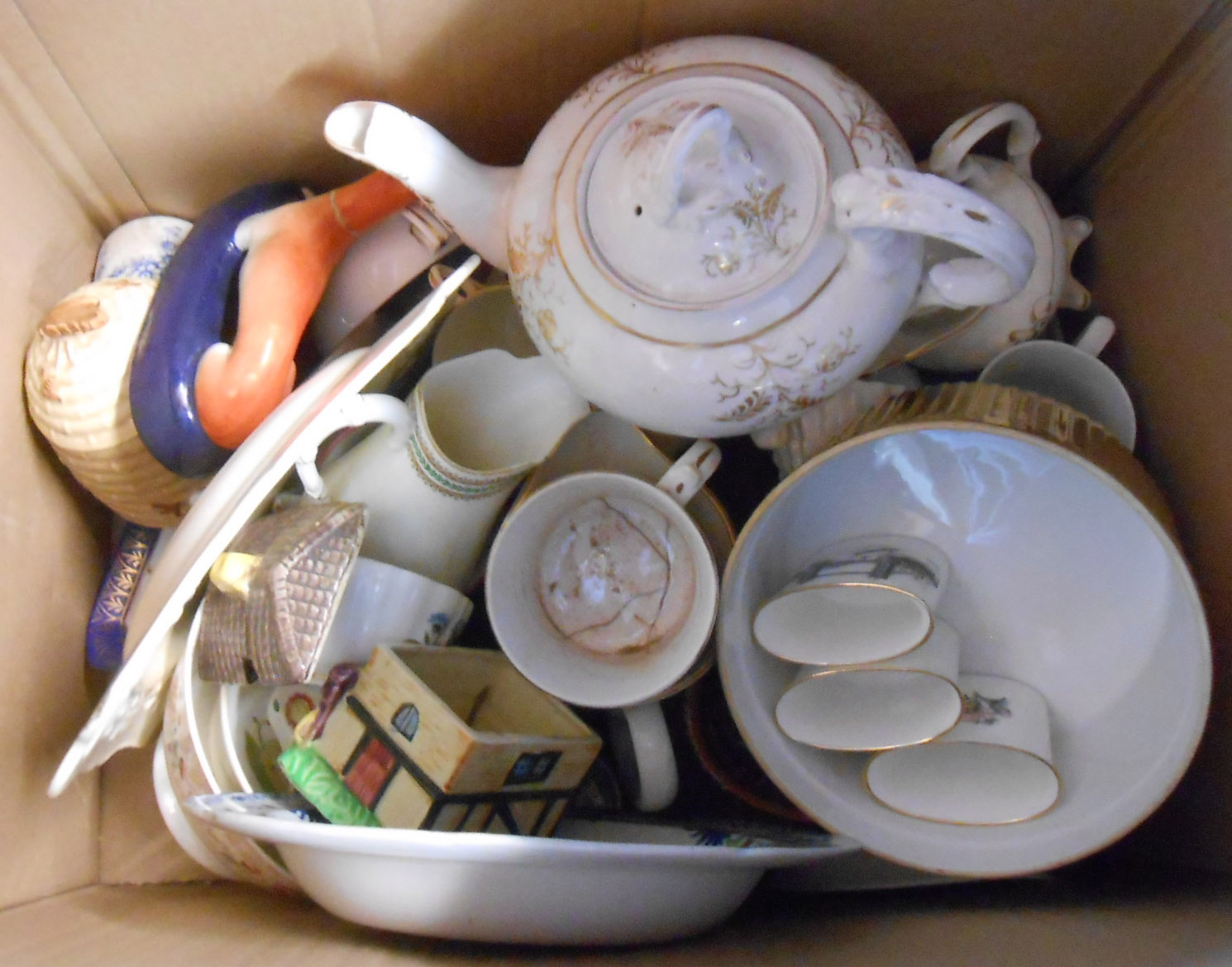 Two boxes containing assorted ceramic items including Shelley part tea set, etc.