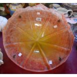 An Art Deco period hanging lampshade in mottled orange and yellow glass with original but adapted