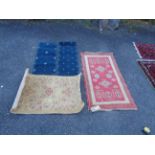 A small handmade Indian kazak rug - sold with a small modern Belgian mat and 2 others