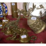A large cast brass 20th Century porch bell decorated with a frieze of cherubs with Gothic