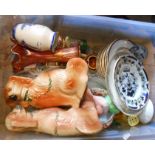 A crate containing assorted ceramic and glass items including Carnival glass, Staffordshire dogs,
