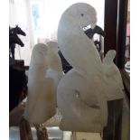 Two pairs of small carved alabaster bookends each depicting a parrot perched upon a rock - sold with