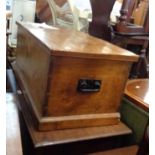 An 87cm antique elm topped stained wood linen chest with flanking iron drop handles - hinges a/f