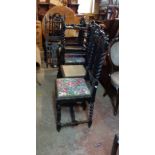 A set of eight Victorian stained oak framed Jacobean style dining chairs with barley twist
