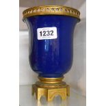 A 19th Century French ormolu mounted porcelain vase in the Sevres style with blue hairsfur glaze