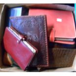 A box containing a quantity of collectable items including assorted leather cases, manicure sets,
