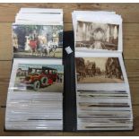 An album containing 20th Century posed photographic portrait postcards, topographic and other