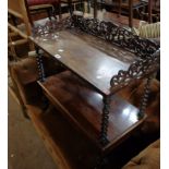 A 76cm 19th Century rosewood two tier stand with fretwork gallery to top, barley twist supports