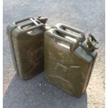 Two green painted jerry cans