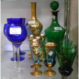 A selection of coloured glassware including Venetian, green and gilt decanter and five glasses,