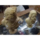 Two modern resin busts, one depicting a classical man, the other the composer Verdi