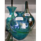 A M'dina glass bottle vase decorated with internal coloured enamels in blues, browns and grens -