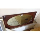 An Edwardian walnut framed wall mirror with oval plate - from a wardrobe